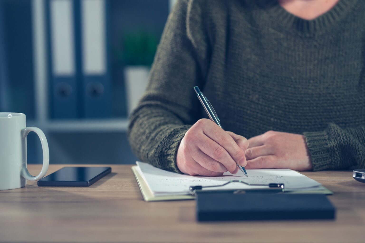 Female freelancer doing paperwork